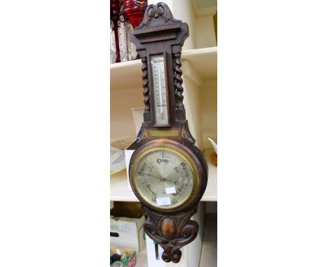 A late Victorian/Edwardian wall barometer, mercury, presented to a member of the Jaeger company, R.D. number 693663, retailed