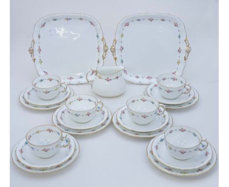 A Royal Crown Derby part tea set, pattern no. '8616', comprising six cups, six saucers and six side plates, a milk jug and tw