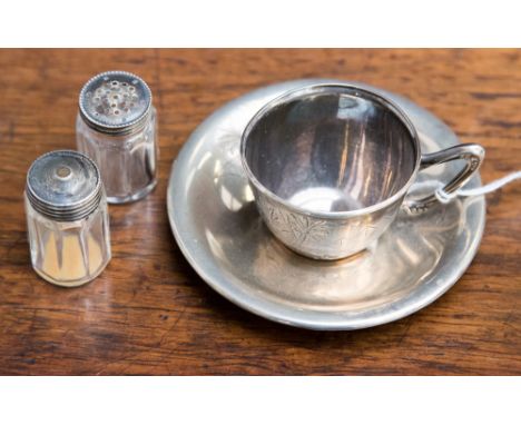A .800 silver cup and saucer, with a sterling silver topped cruet set, approx. weight 1.16 ozt /36.grm (4)