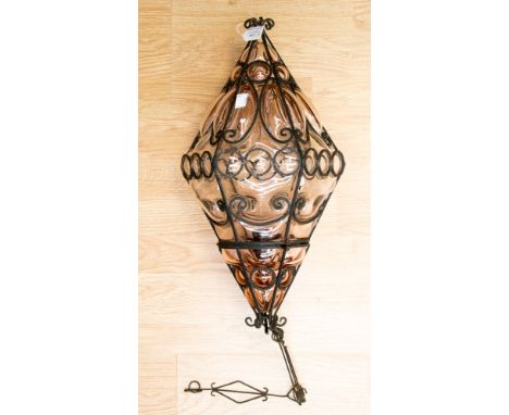 An Arts and Crafts blown glass lamp