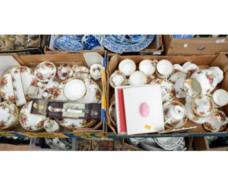 A collection of Royal Albert 'Old Country Roses' tea and dinnerware to include, teapot, cups, saucers, vases, etc (2 boxes)