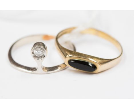 A 14 ct white gold and diamond ring size L, together with a 9 ct yellow gold ring with black onyx stone, size N 