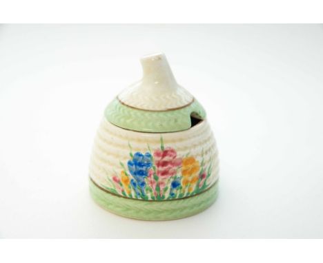 Clarice Cliff for Newport Pottery, a 'Spring Crocus' beehive honey pot, Newport marks