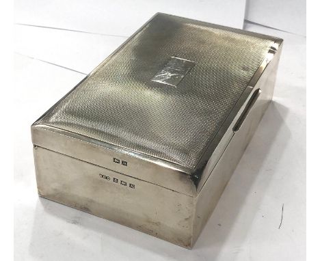 Engine turned cigarette box, good overall antique condition, Birmingham silver hallmarks. Approximate measurement 16 cm , 9cm