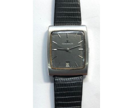 Vintage Jaeger-Lecoultre gents wristwatch stainless steel case grey dial watch winds and ticks but no warranty given. 