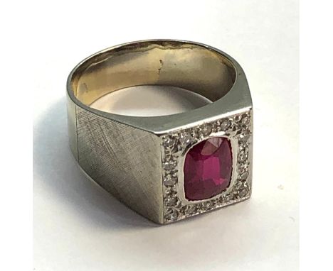 Fine Ruby and Diamond ring large central ruby set in white gold ruby measures approx 7.5mm by 6mm set with diamonds around we