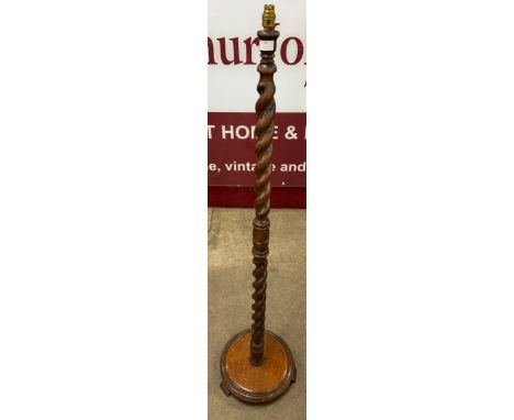 An early 20th Century oak barleytwist standard lamp 