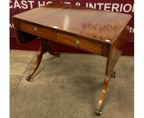 A Regency style inlaid mahogany sofa table 