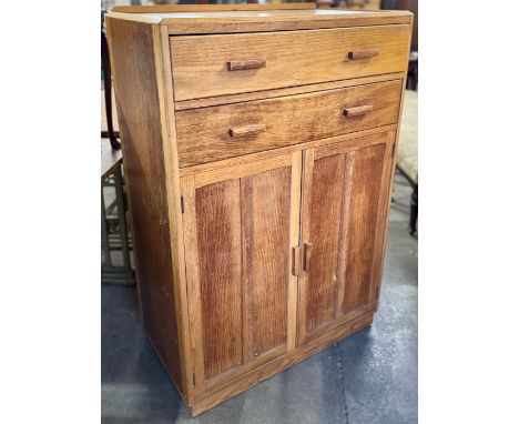A light oak tallboy 
