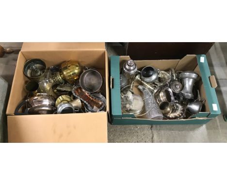 Two boxes of assorted silver plate, brass and copper, including a cocktail shaker, claret jug, tea service, tray, oil lamp an