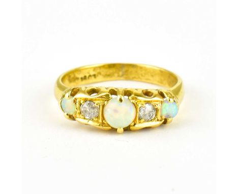 An 18ct gold diamond and opal ring, size O, approx. 3.7g.