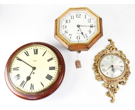 Three wall clocks, comprising a Garrard octagonal wall clock, the white enamelled dial set with Arabic numerals, within minut
