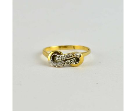 A 9ct gold ring set with tiny diamonds to the bow-shaped top, size P, approx. 2g.