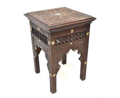 An Indian carved side table with inlaid mother of pearl star shape decoration and bobbin turned detail, 53 x 37 x 37cm. 