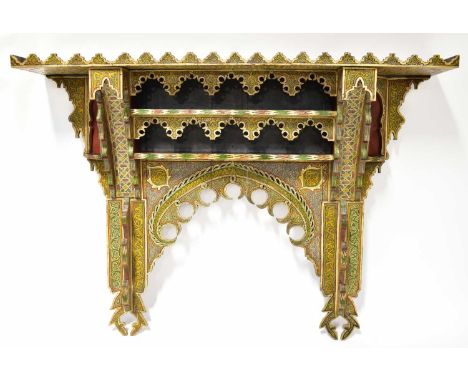 A Moorish ornate painted wooden shelf with pierced and scrolled decoration, 101 x 132cm.Condition Report: Two back plank join