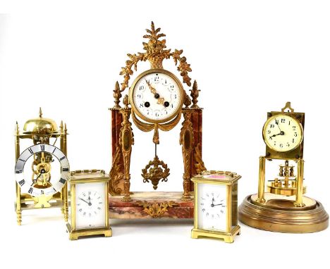 A French gilt brass mounted drum timepiece, raised on rouge marble pilasters to matched base, a Gustav Becker brass anniversa