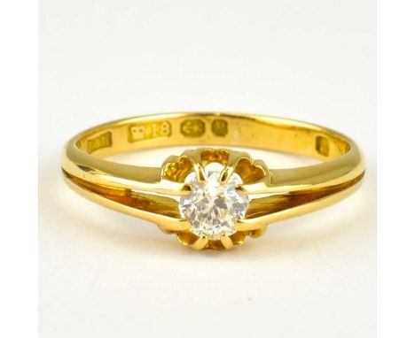 An 18ct gold ring with claw set brilliant solitaire diamond, approx. 0.3ct, size V, approx. 4.6g.