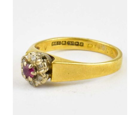 A vintage 18ct gold ruby and diamond cluster ring, size N, approx. 3.8g.