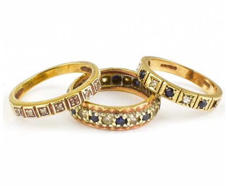 Three 9ct gold rings comprising a full eternity ring set with diamond and sapphires, size K, and two half eternity rings, one