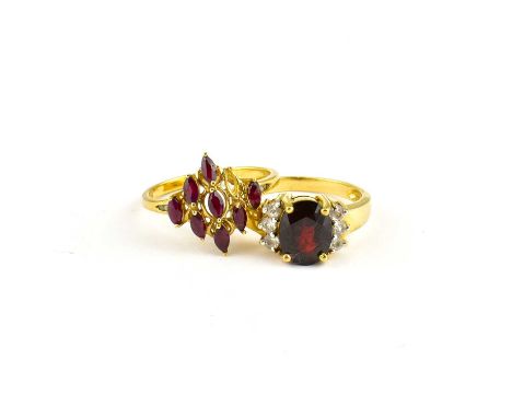 A 9ct gold ruby cluster ring, size O, approx. 2g, together with a 9ct gold claw set garnet ring with single row of three tiny