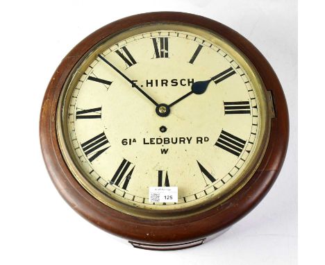 E. HIRSH; an early 20th century mahogany cased station-type wall clock, the 12" enamelled dial set with Roman numerals, inscr