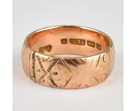 A 9ct rose gold band ring with pattern, size Q, approx. 6.4g.