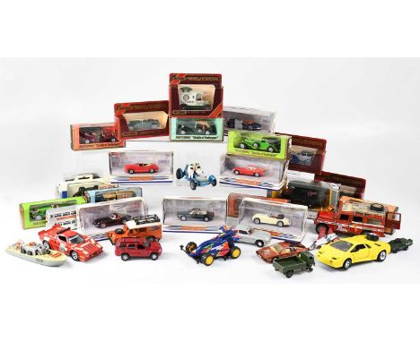 A quantity of boxed and loose scale models of vehicles to include six Chinese made Matchbox Dinky cards, 1973 MGB GT V8, a lo