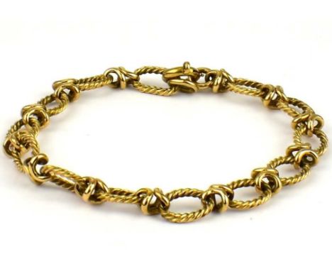 A 9ct rose gold bracelet with rope twist oval and knot links, with ring clasp, length 18cm, approx. 19.2g.