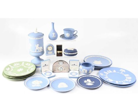 WEDGWOOD; a collection of jasperware, to include a blue urn with cover and finial of a young boy, height approx. 31cm, two gr