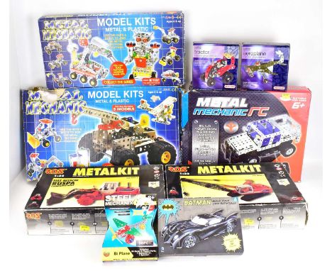 Nine children's model construction kits comprising Ros Metalkit with plastic parts, Fiat-Hitachi GRU CX500, and a Fiat-Hitach