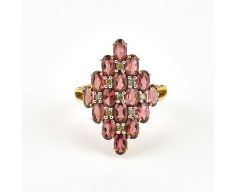 A 9ct gold contemporary dress ring, cluster setting of trapezium shape with claw set opal red/pink stones with tiny claw set 