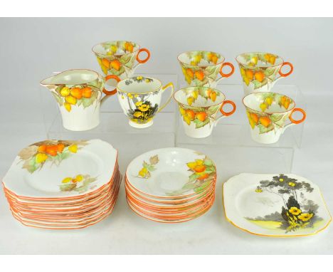 SHELLEY; an eighteen-piece Art Deco part tea service with hoop handles and Autumn flowers and leaves, pattern no. 12299, comp