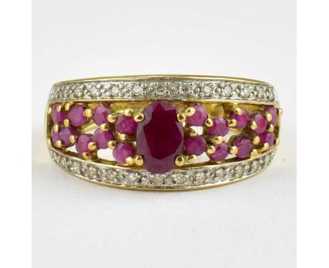 A 9ct gold ruby and diamond cluster dress ring, size O, approx. 3.2g.