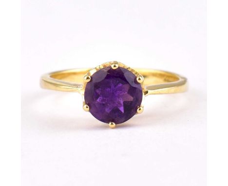 A 14ct gold single claw set amethyst ring, size N, approx. 2.6g.