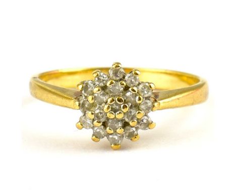 A 9ct gold diamond floral cluster ring, stated carat approx. 0.2ct to inner shank, size N, approx. 2.3g.
