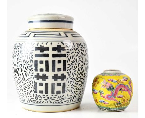 A 19th century double happiness blue and white lidded ginger jar with double ring mark to base, height 25cm, and a Famille Ja