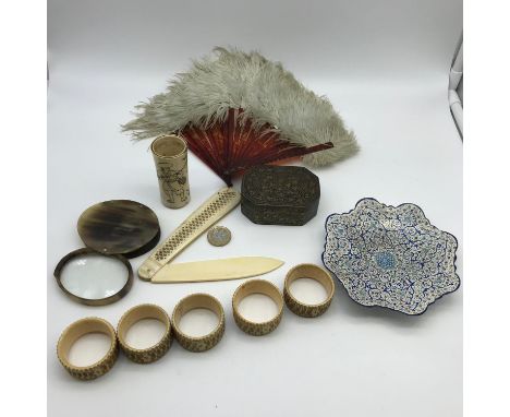 A Lot of collectable odds which includes Ostrich feather and tortoise shell fan, Hand painted enamel plate, 5 Bone napkin rin