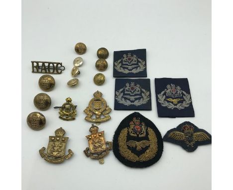 A Lot of Military Cap badges and patches, Includes WW2 Indian Army Ordnance corps cap badge, various R.A.O.C. Badges and butt