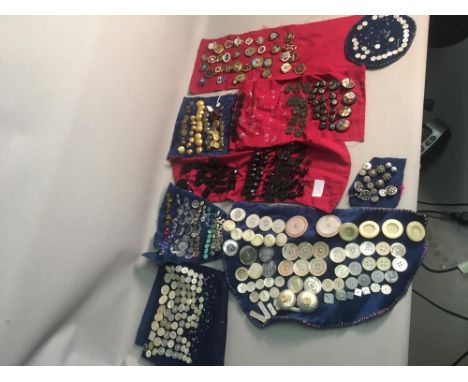 A large Array of Buttons, to include Military Ornate, vintage, Retro Contemporary and a Large Collection of Pin Badges. 