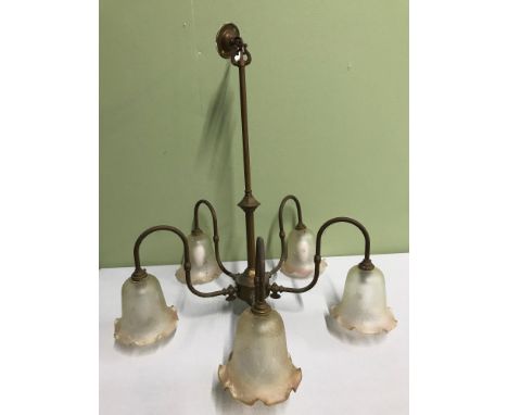 An early 1900's gas light fitting, presented with five art nouveau shades 