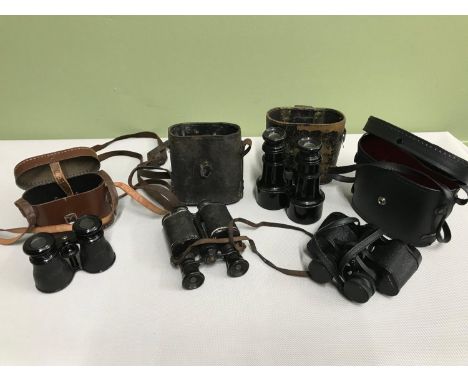 A Lot of 4 vintage binoculars with cases. 