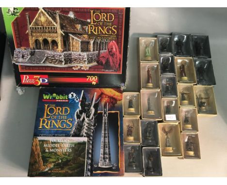 Lord Of The Rings Collectables to include Two 3D Jig-saw a 40 Postcard Book and 23 boxed figures. 