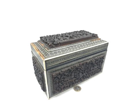 A 19th Century Anglo- Indian carved with micromosaic Vizagapatam 2 section tea caddy. Measures 15.5x24x14cm (Damage to areas)