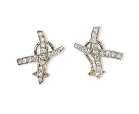 pair of platinum earrings, model ‘Graffiti’, created by Paloma Picasso for ‘TIFFANY & CO’ in 1985, set with brilliant-cut dia