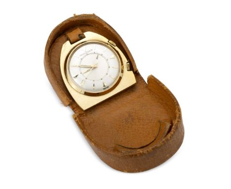 Mini pocket alarm clock forming a gilded stirrup. Silvered dial, diamond hour markers and dauphine hands. Can also be used as