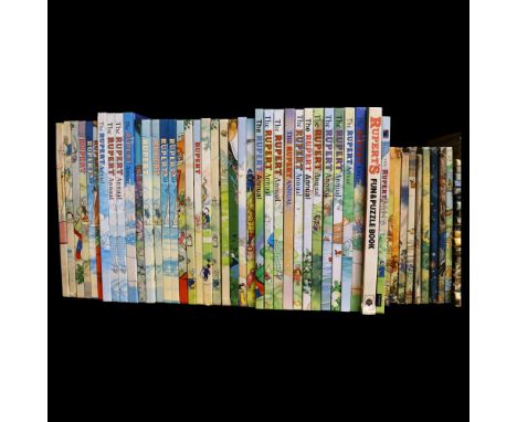 A shelf full of Rupert annuals, Beano and Dandy annuals
