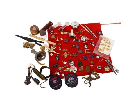 A box of various items, including glass knife rests, a Hughes's pocket balance, various badges, buttons, miniature tortoisesh