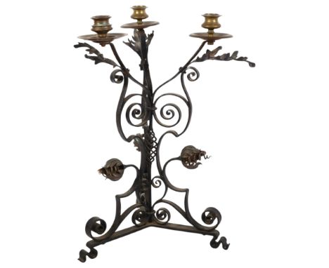 A late Victorian Arts and Crafts 3-branch candelabrum in wrought-iron and brass, in the manner of W A S Benson, H42cm