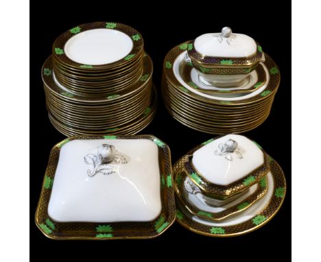 A Malingware part dinner service, consisting dinner plates, soup bowls and various tureens, with gilt and cobalt blue decorat