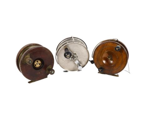 An Allcocks 6" sea fishing reel, a walnut 6" reverse ratchet reel with star back, and a 6" brass and wooden reel with star ba